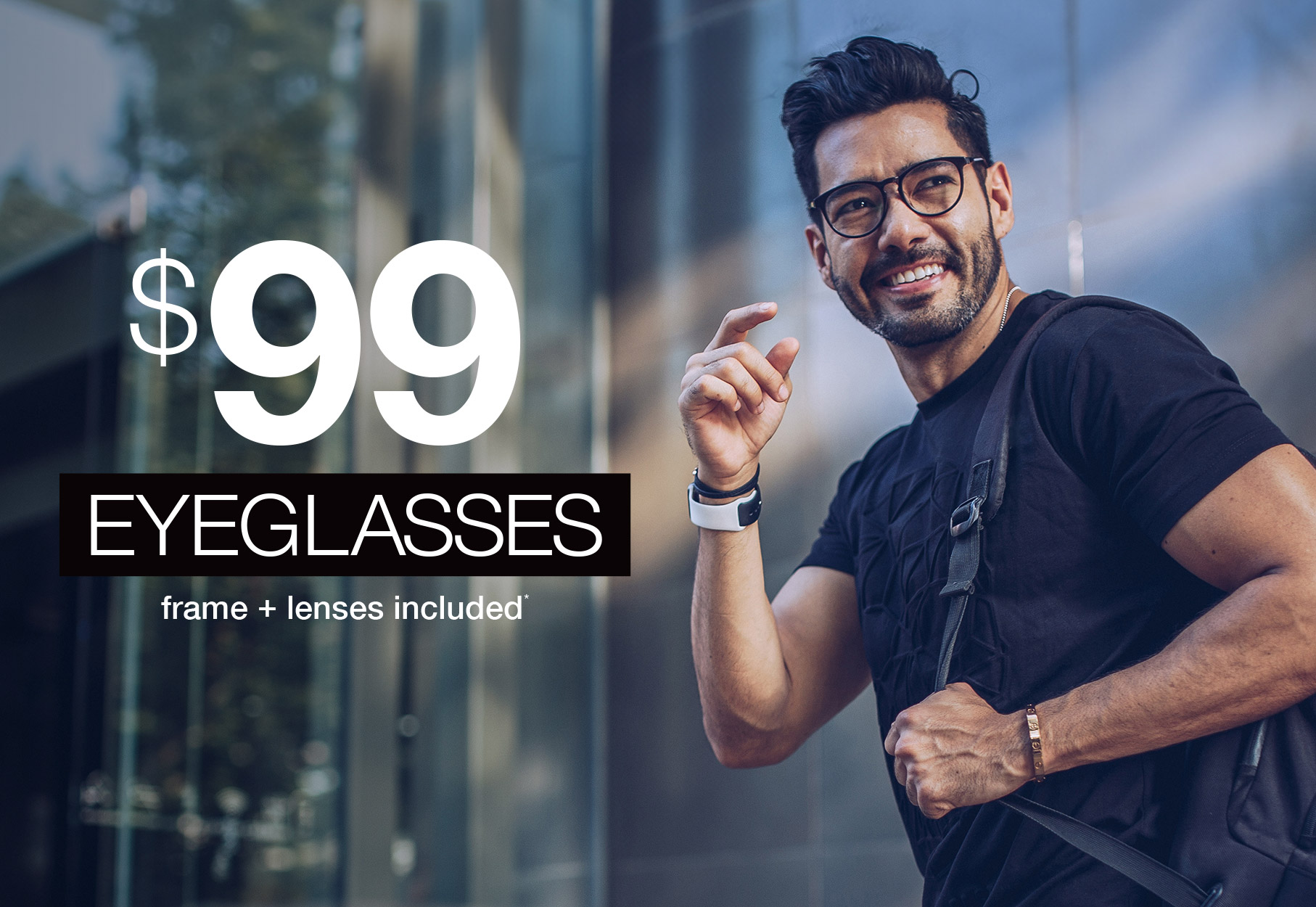 Text: $99 Eyeglasses frame + lenses included* Photo: smiling man wearing eyglasses and a black t-shirt with a backpack over his shoulder